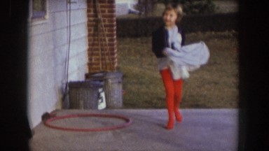 1957: small girl dances on patio NEBRASKA