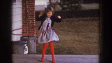 1957: little girl playing with her hula-hoop. NEBRASKA