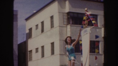 1952: three pretty ladies ride floats, and perform in a parade CALIFORNIA