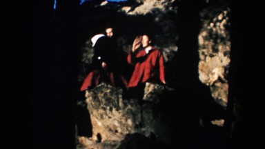 1953: two girls in red dress on the hillside SOUTH DAKOTA