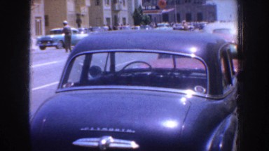 1952: a group of people marching downtown and some shots of the city CALIFORNIA