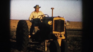 1953: using a farm tractor SOUTH DAKOTA