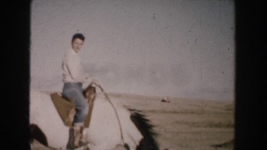 1953: A Woman Riding a Horse in South Dakota