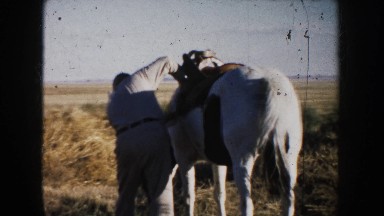 1953: Man and Horse on a Field in South Dakota