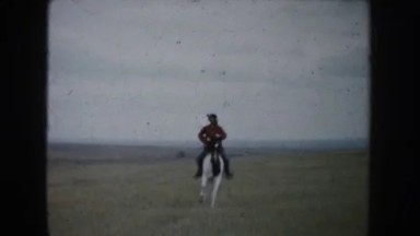 1953: woman riding on horseback in the wilderness SOUTH DAKOTA