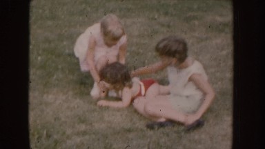 1955: three babys enjoy in the ground with family NEBRASKA