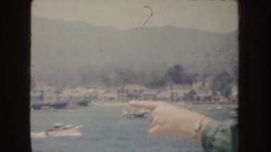 1952: Footage of a Busy Lake Near a Large Rock California