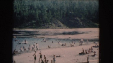 1954: People Swimming at a Beach South Dakota
