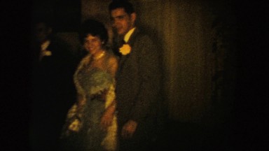 1954: adult couples at a formal party posing and smiling, and exiting SOUTH