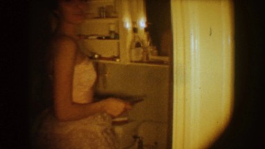 1954: woman in the bathroom getting ready SOUTH DAKOTA