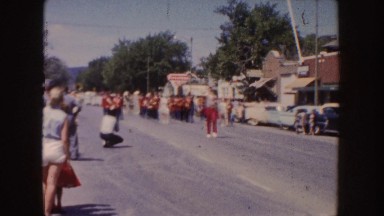 1954: parade down a small town street with a marching band SOUTH DAKOTA