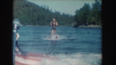 1954: a man waterskiing behind a motorboat during the summer SOUTH DAKOTA