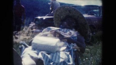 1954: two people are busy in talking to each other outside SOUTH DAKOTA