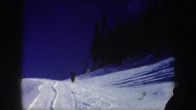 1962: A Group of People Snowboarding Off a Mountain in New Hampshire
