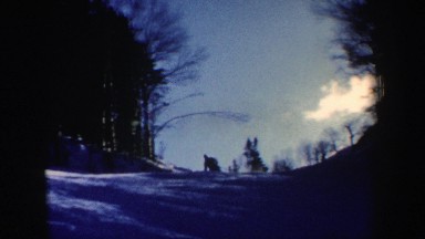 1962: a man skis down a steep hill before coming to a stop NEW HAMPSHIRE