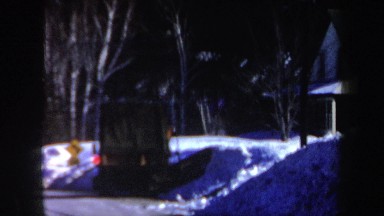 1962: machine plowing snow from a small slope adjacent to a house NEW HAMPSHIRE
