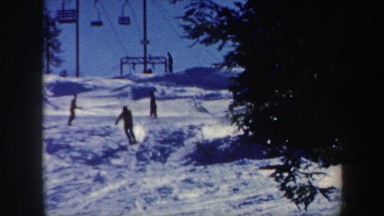 1962: people playing with scatting,around the snowfall VERMONT