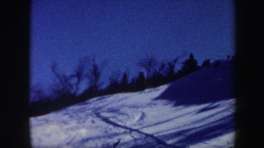 1962: the person is skiing in the slopes near snow. VERMONT