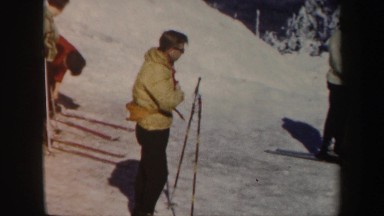 1962: group of men go skiing, each requires help putting on their equipment