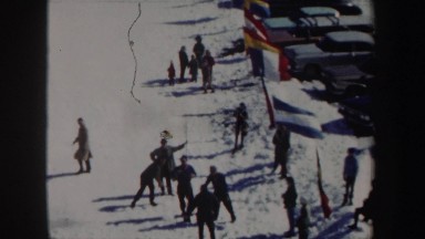 1962: assorted people at a skiing site lay out international contest boundaries