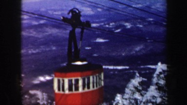 1962: A Ski Lift Moving Through a Snowy Forest in Vermont