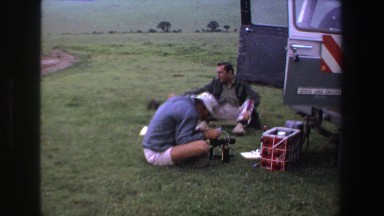 1969: Friends Enjoying Conversation While Preparing to Work in the Great Outdoors