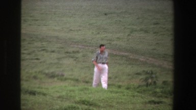 1969: a man walking through a field SOUTH AFRICA