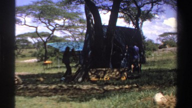 1969: people carrying a big fabric structure NIGERIA