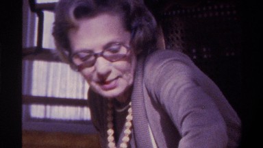 1975: older woman playing with a young girl FLORIDA
