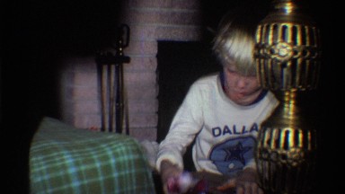 1975: an eager child unwraps a present FLORIDA