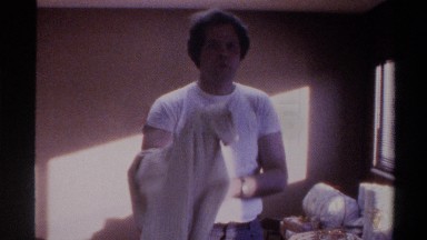 1975: preparing to leave the house to get to work well dressed and character to