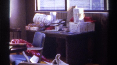 1975: a woman wrapping up gifts FLORIDA