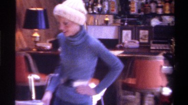 1975: mom and children opening gifts on christmas day FLORIDA