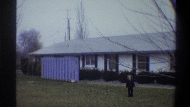 1973: young girl playing outside her home NEW YORK