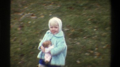1973: little kids playing out in the yard. NEW YORK