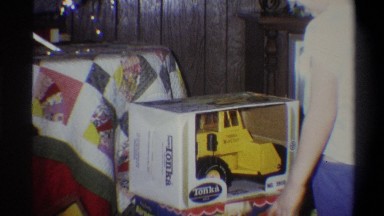 1973: toehead boy with new toy tractor NEW YORK