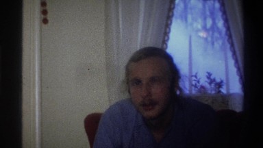 1973: a man in a blue shirt smiles at you NEW YORK