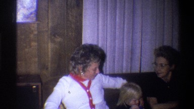 1973: Old Guys and Young Kids Sitting on a Sofa New York