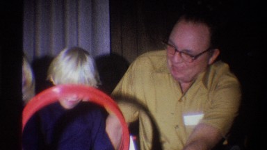 1973: grandparents watching two grandchildren playing NEW YORK