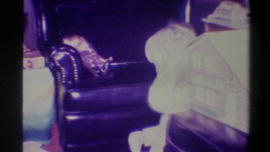 1973: child enjoying herself with shiny toy. NEW YORK