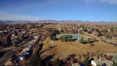 2016: Flying Over a Tennis Court on a Hill on the Edge of Town COLORADO