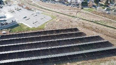 2016: Aerial View of Solar Panels by Train Tracks Colorado