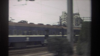 1982: looking outside a window at another train passing by TAIWAN