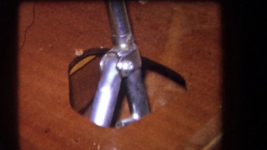1964: wooden structure surrounds dashboard of round instruments facing curved