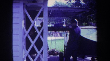 1969: residential area man standing in veranda VOLMER YUCAIPA CALIFORNIA