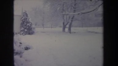 1968: Classic House in a Silent Winter Day Surrounded by Heavy Snow MICHIGAN
