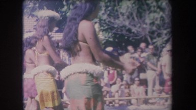 1969: hula dancers performing before a crowd of onlookers HAWAII