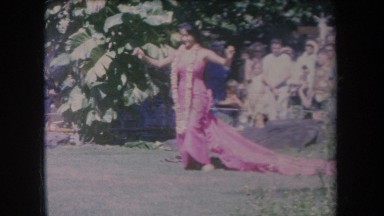1969: Pretty Lady Dances in Pink Dress Outside Hawaii