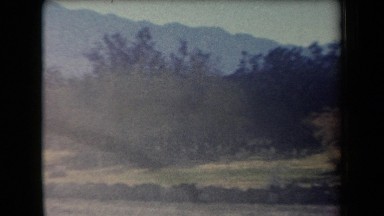1958: overview of a rural area with mountains, meadows and roads ARIZONA