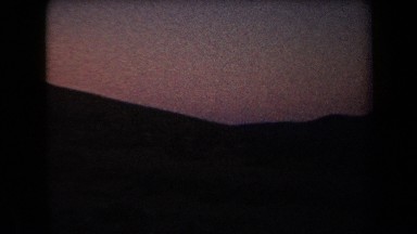 1958: group of people walking around desert at sunset ARIZONA